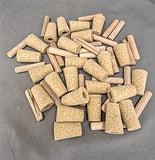 First Grade Agglomerated Tapered Cork Bottle Stoppers with 3/8 x 1 3/4” Birch Dowels.